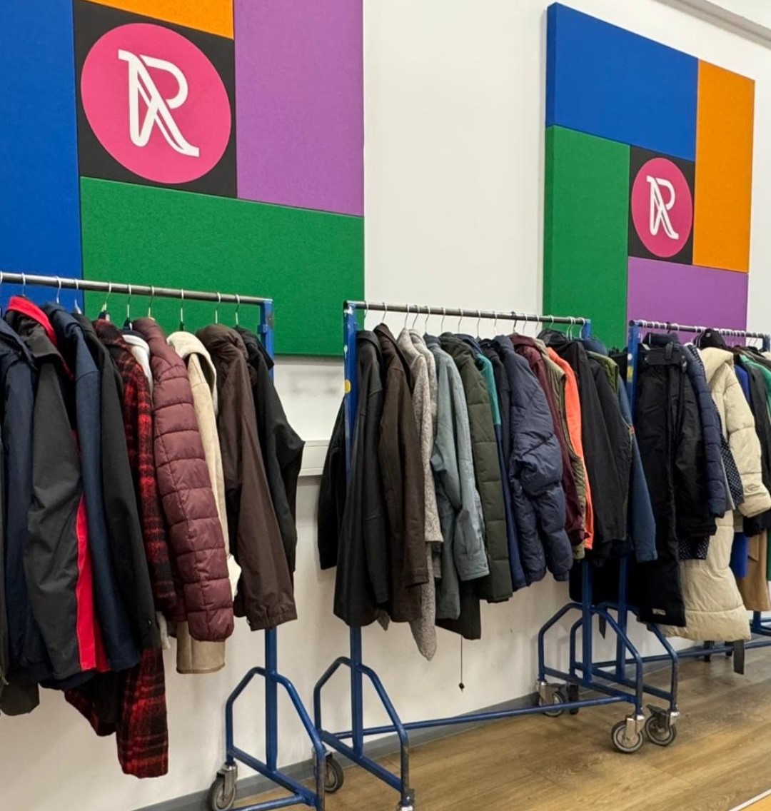 Clothes rails with coats on 